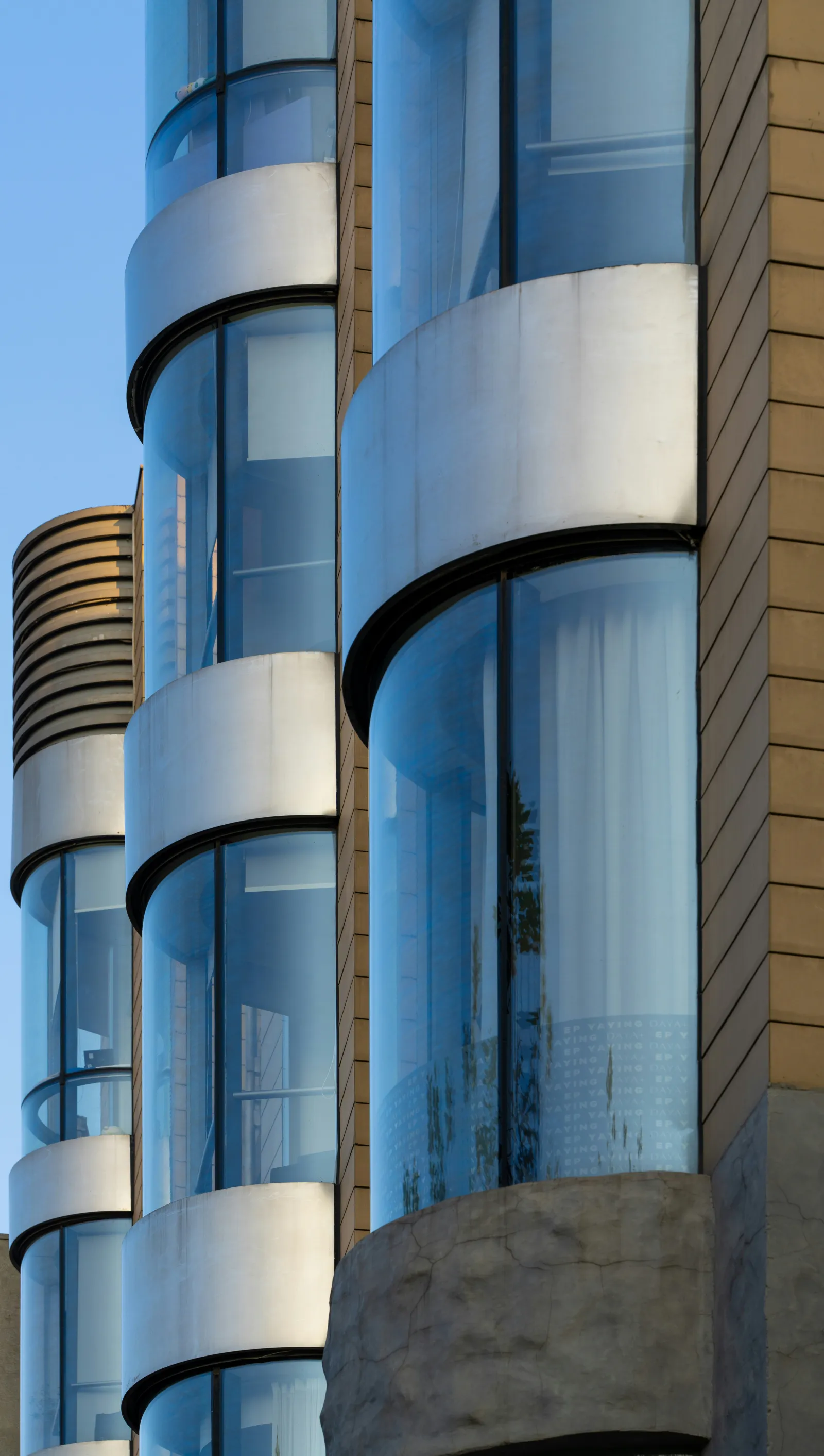 Class A office building with glass curtain wall facade and professional landscaping